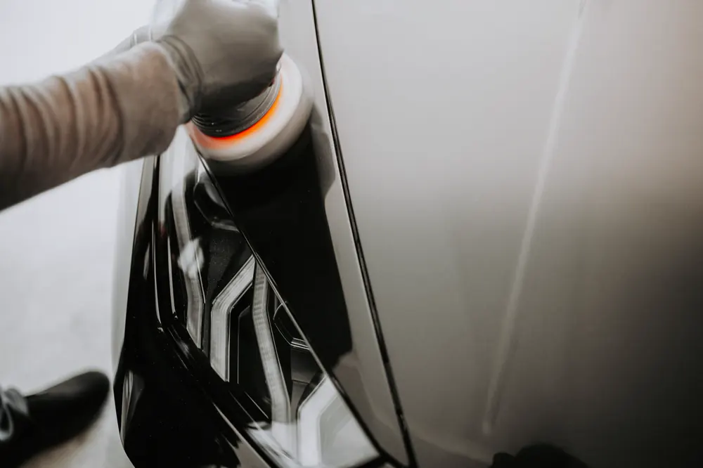 Machine polishing automotive paint