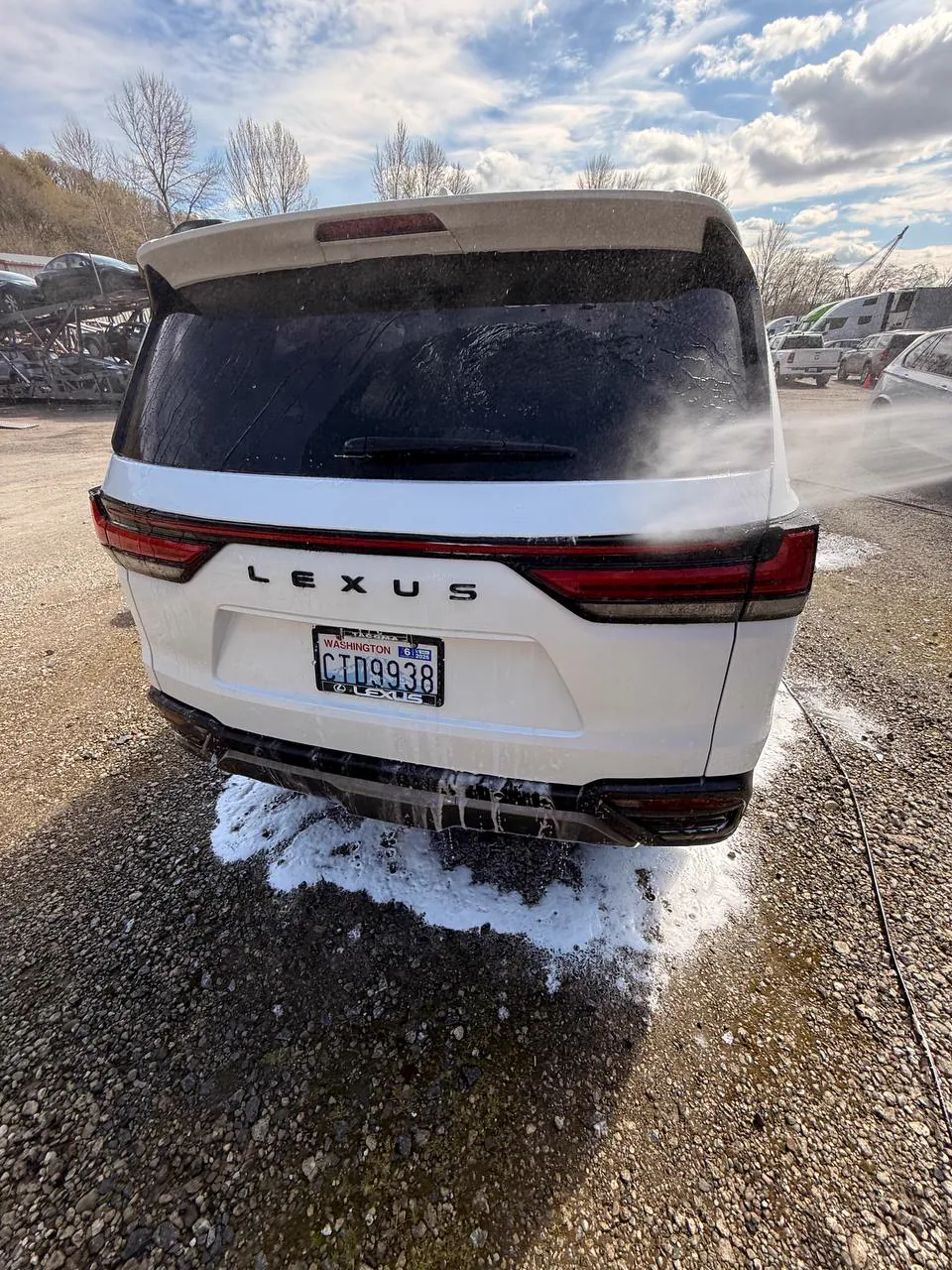 Exterior detailing in progress at a customer location