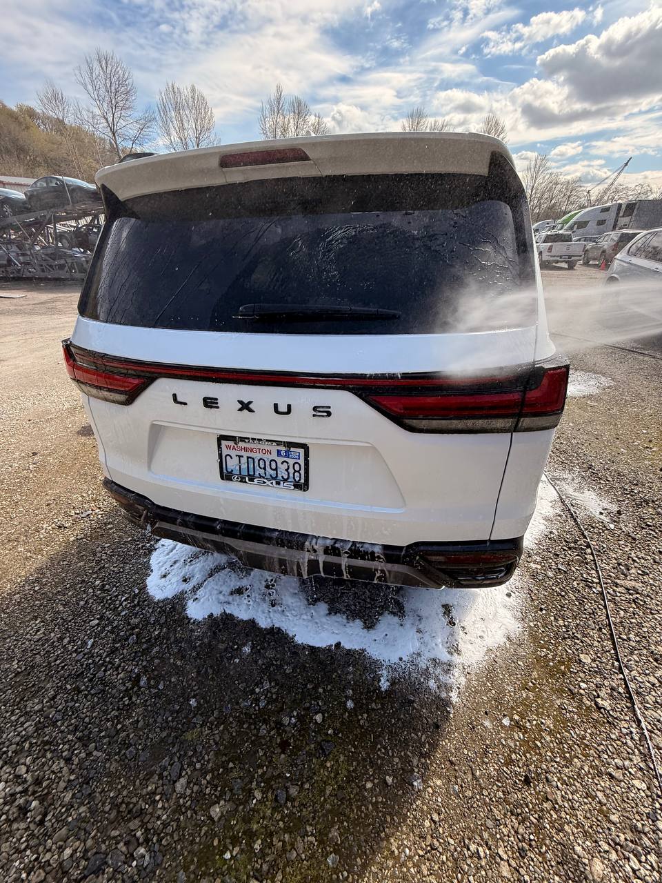 Exterior detailing in progress at a customer location